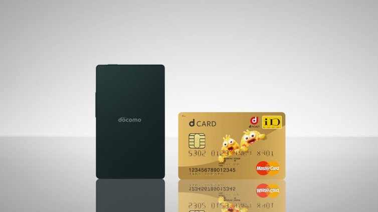 Kyocera smartphone next to a credit card