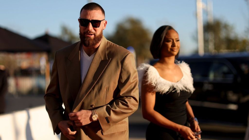 Travis Kelce and girlfriend, Kayla Nicole, arrive to the NFL Honors show at the YouTube Theater on February 10, 2022 in Inglewood, California.
