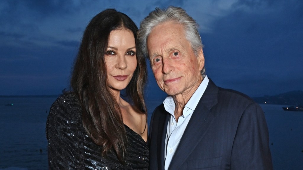 Michael Douglas & Catherine Zeta-Jones Kiss Daughter Carys On Her Graduation