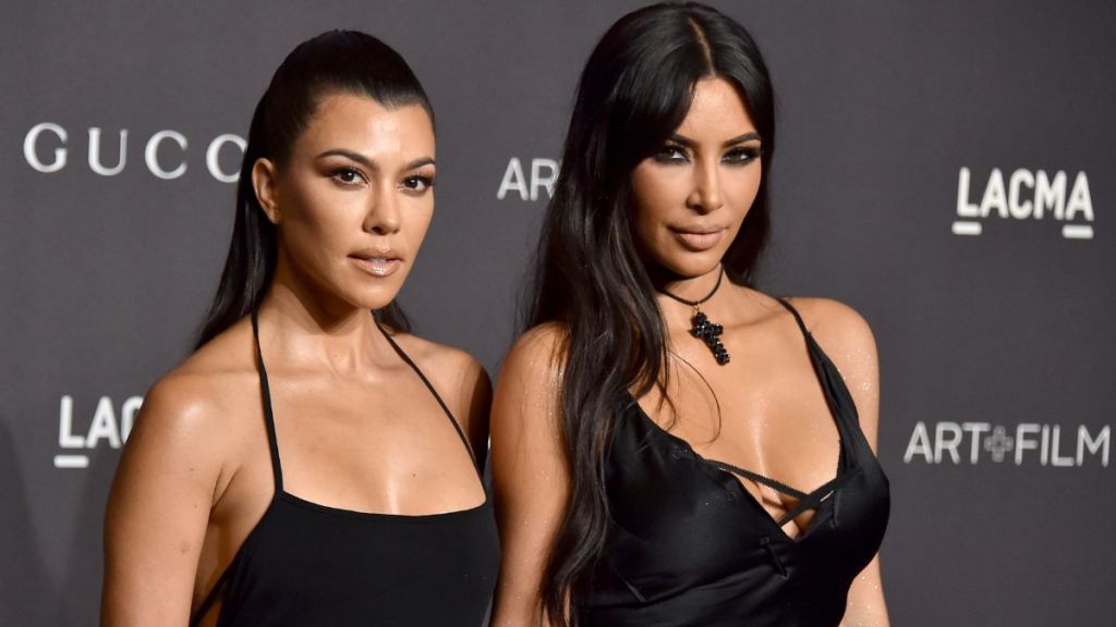 Kim & Kourtney Clash Over Each Other's Views on Fame, Says 'Source'