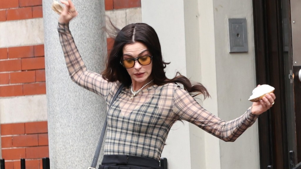 Anne Hathaway Barely Avoids a Mini-Skirt Wardrobe Malfunction