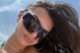 Photos: Emily Ratajkowski's Sheer, Plunging Outfit Does Its Job a Little Too Well