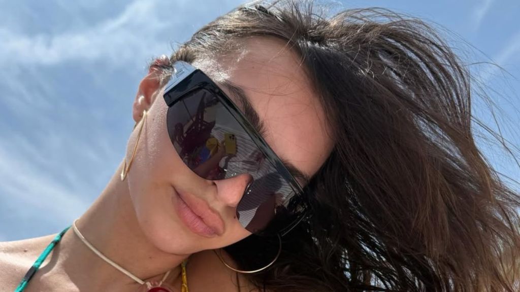 Photos: Emily Ratajkowski's Sheer, Plunging Outfit Does Its Job a Little Too Well