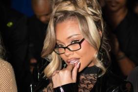 Fans React to Latto in Sheer Black Dress With Librarian Glass: 'Blessed Face'