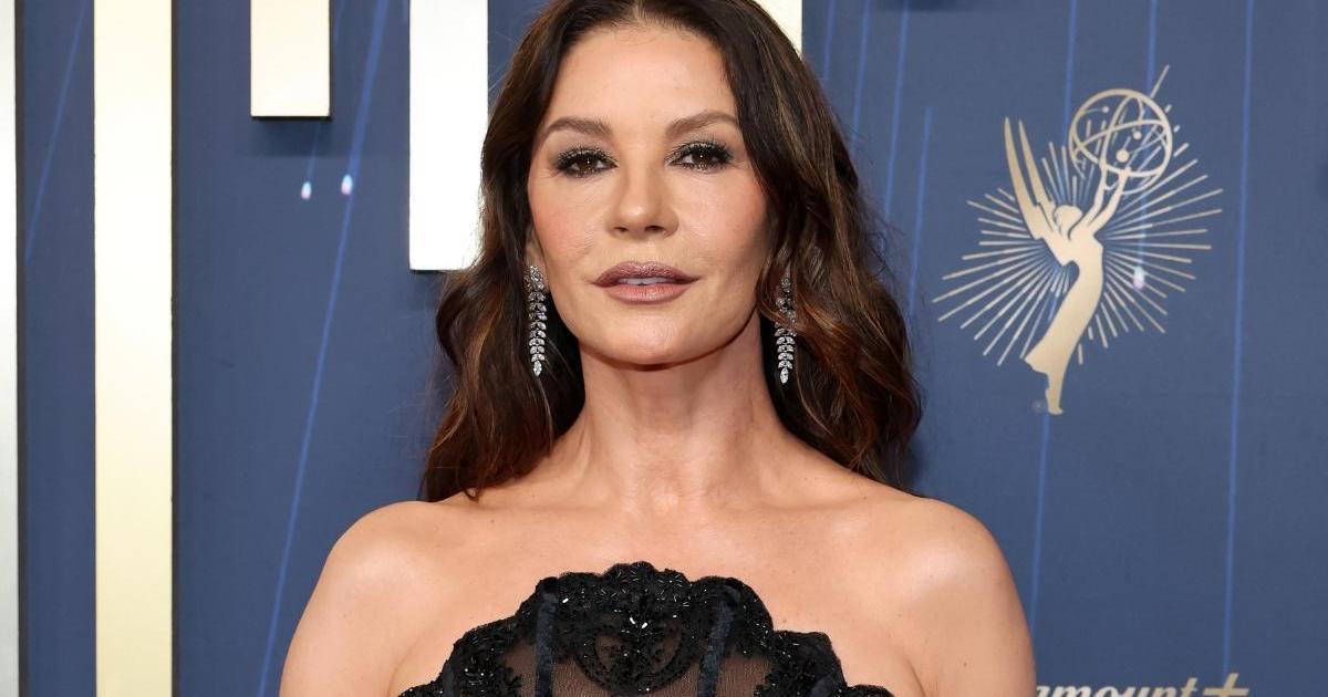 Catherine Zeta-Jones Channels Morticia Addams in Sheer Black Corset Gown -  Mandatory