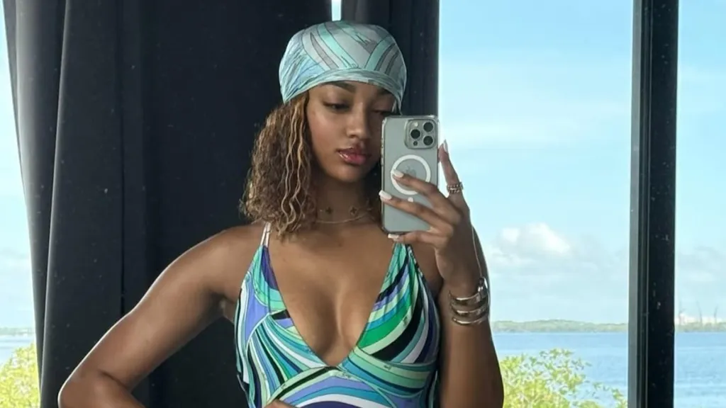 Angel Reese Shows Off Her Toned Body in Swimsuit Look 