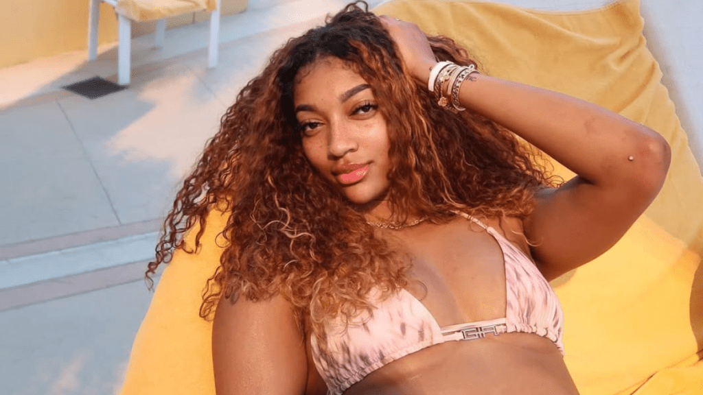 Angel Reese Looks Like 'Barbie' in Bold Neckline Black Dress