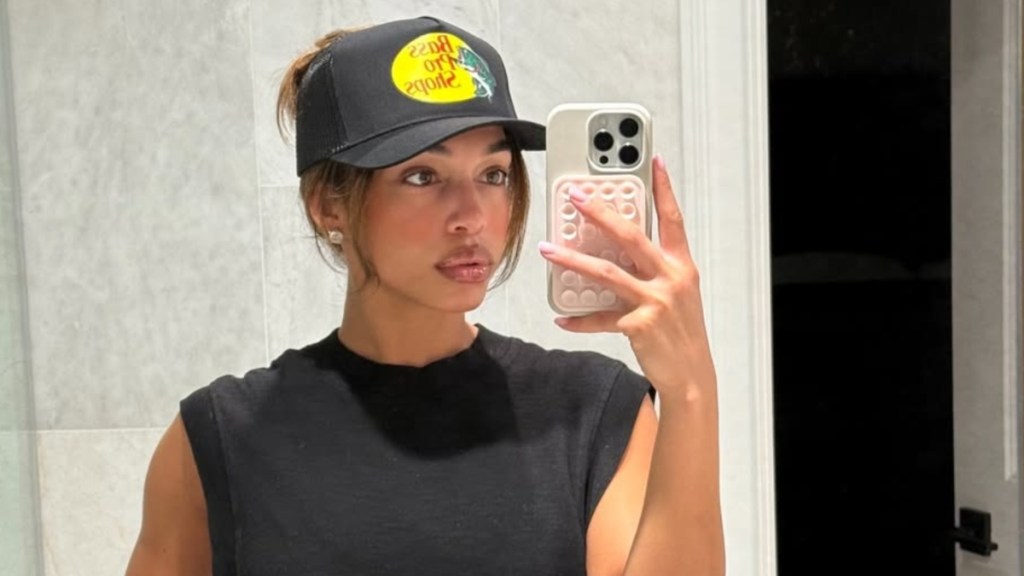 Lori Harvey Showcases Her Toned Abs in Black Bikini