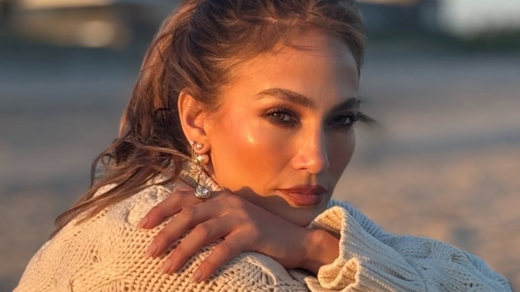 Jennifer Lopez’s ‘Beauty Is From Other World’ in Knit Sweater & Mini-Skirt Look