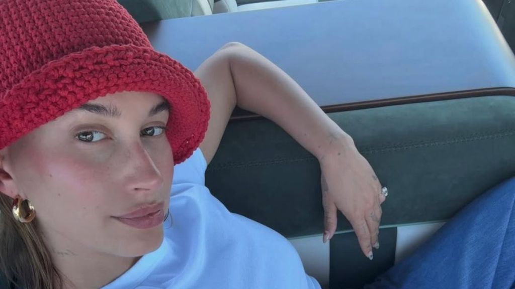 Hailey Bieber Unbuttons for DKNY in New Photos