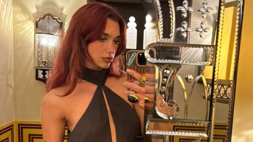 Dua Lipa Elevates Her Plunging Bodysuit With Boudoir-Inspired Details