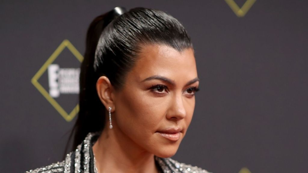Kourtney Kardashian's Daring Neckline Polka Dot Dress Deserves Second Glance