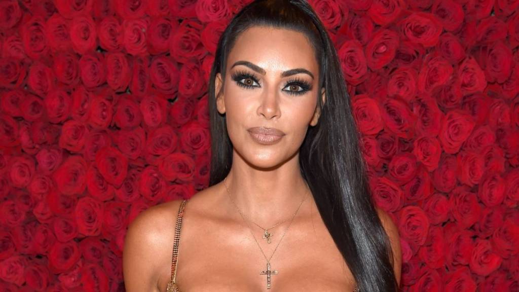 Kim Kardashian ‘Can't Stop Serving’ in Metallic Gold Corset Look