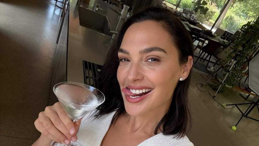 Gal Gadot Sticks Her Tongue Out With Martini in Summer Snaps