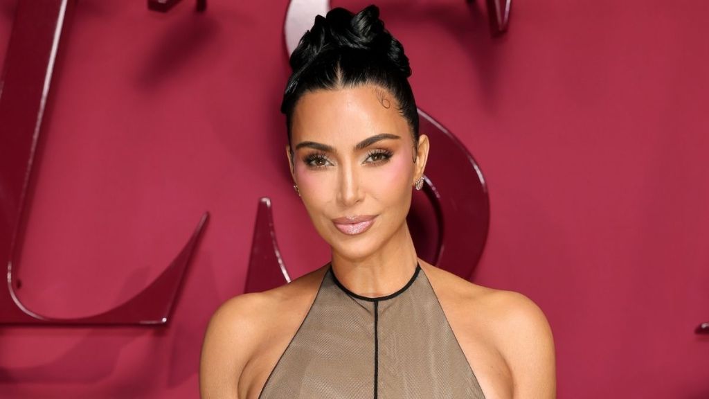 Kim Kardashian Turns Heads in Sleeveless Dress