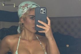 Kim Kardashian Shows Off Her Waist in Workout Fit With Gym Selfie
