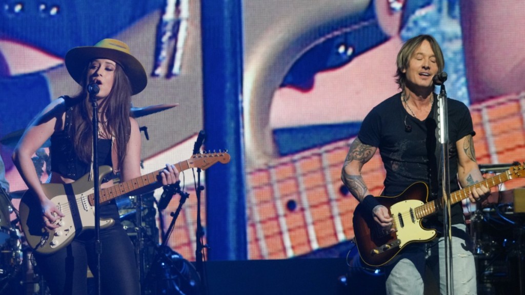 Keith Urban Linked to Younger Bandmate — Her Father Weighs In