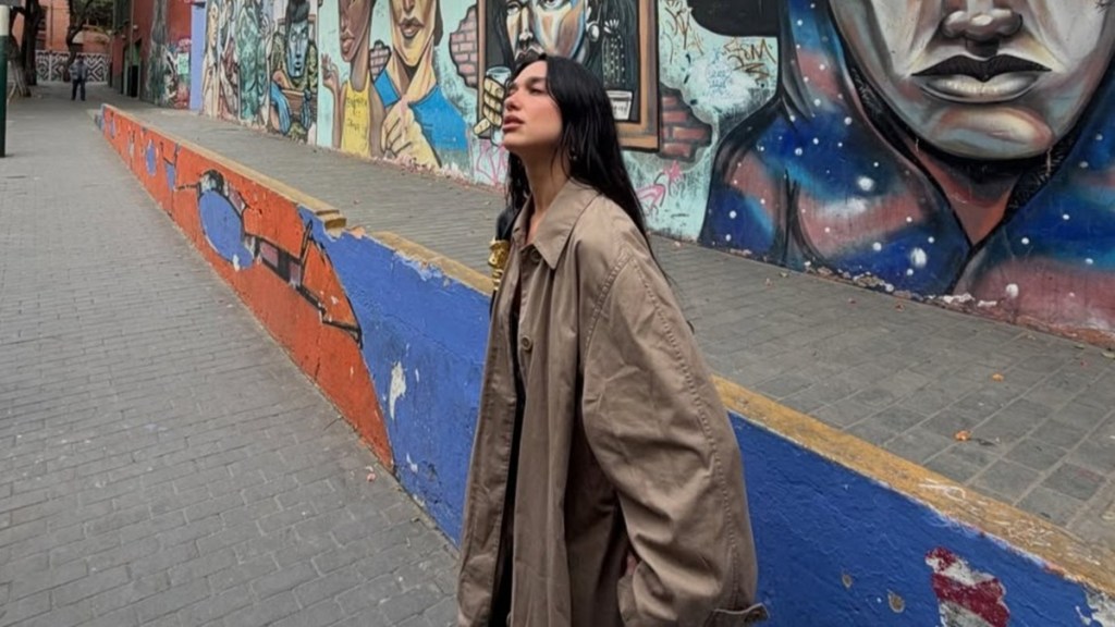 Dua Lipa Posing in Trench Coat Proves She's a Style Icon