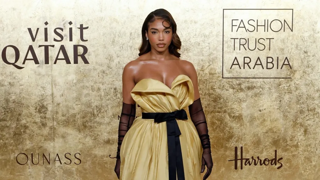 Lori Harvey in Thigh-High Slit Dress Has Fans Saying 'Damn Girl'