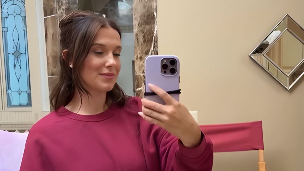 Millie Bobby Brown's Playful Minidress Video Mixes of Fun & Flirty
