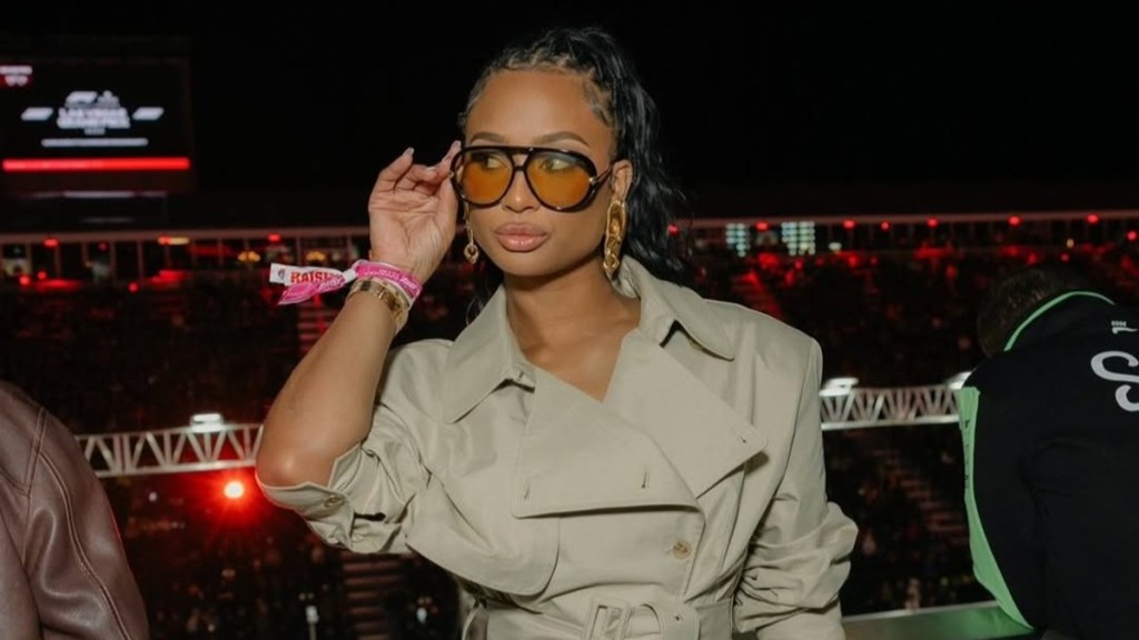 Travis Kelce's Ex Looks 'Stunning' in Trench Coat Romper