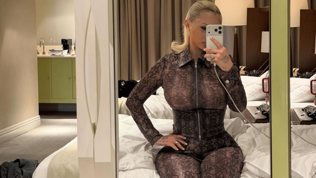Alabama Barker Flaunts 'Hottt' Thong in Sheer Catsuit Photos