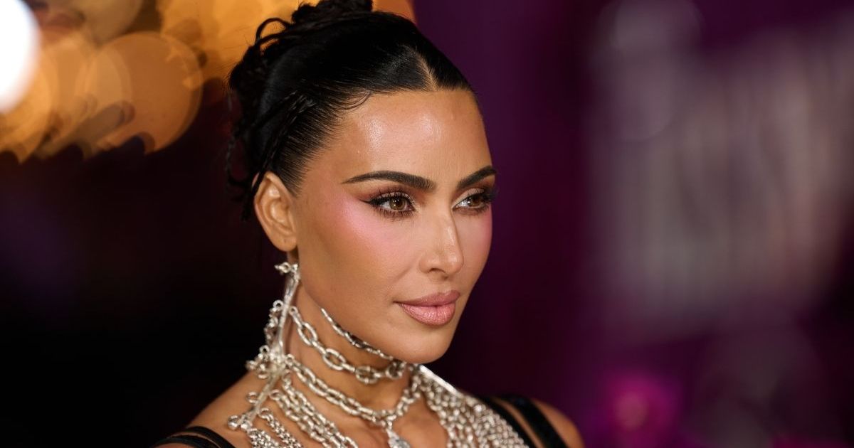 Kim Kardashian in Red Backless Dress Is Must See