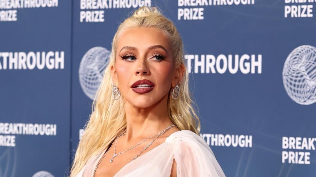 Christina Aguilera’s Bodysuit & Sheer Tights Are the Season's Look