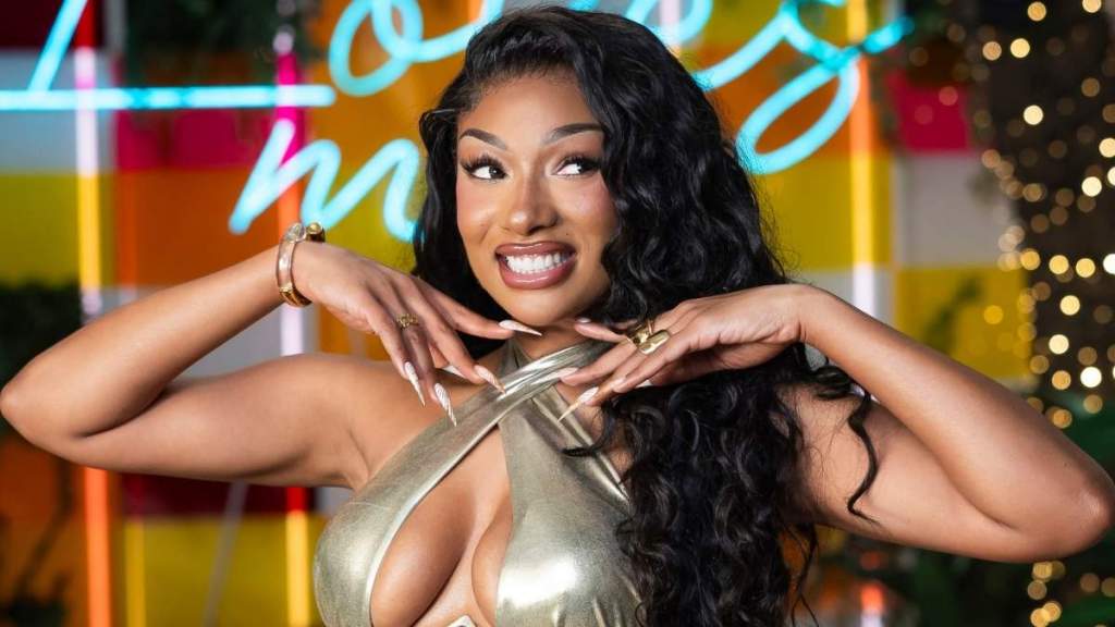 Megan Thee Stallion Flashes Her Midriff in Eye-Popping Yellow Crop Hoodie