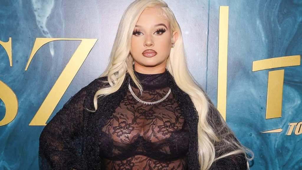 Alabama Barker Turns Heads in Red Thong TFS: Alabama Barker Posing in Red Thong Will Make You Look Twice