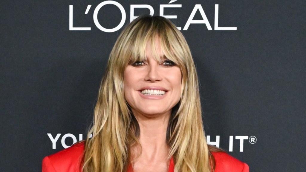 Heidi Klum’s Jaw-Dropping Red Lacy Tights Will Make You Stare