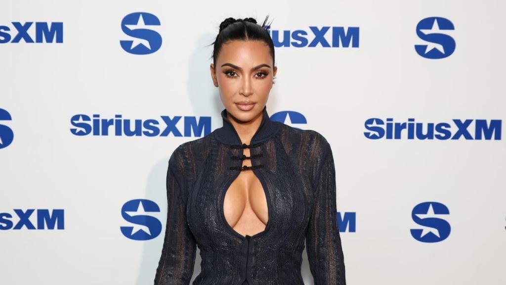 Kim Kardashian Sitting in Mini-Dress Is Must See