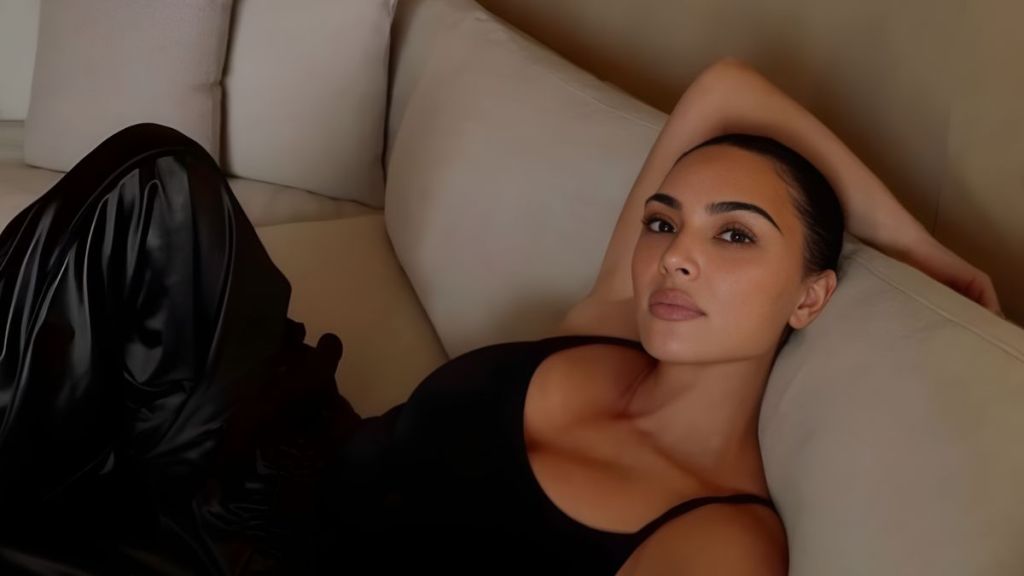 Kim Kardashian Lying Down in Tank Top Is Must See