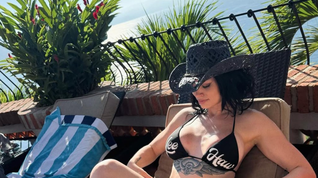 WWE's Saraya Bevis Sitting in String Bikini Is Hard to Ignore