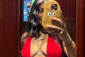 Sza’s Lingerie Corset Photo Shows off Cheeky Tie-up Detail