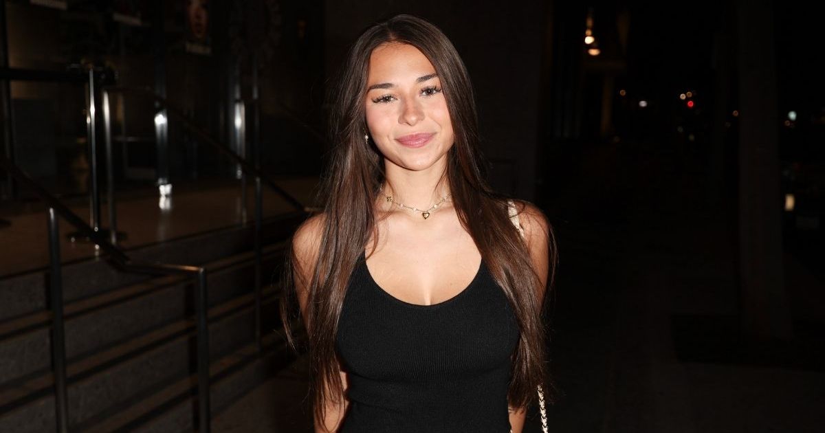 OnlyFans' Sophie Rain Sitting in Mini-Shorts Will Make You Look Twice