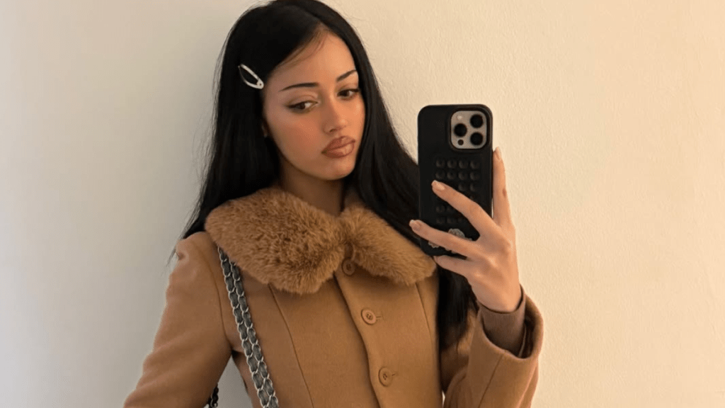 Cindy Kimberly’s Thong Peeks Through Her Sheer Dress in Photos