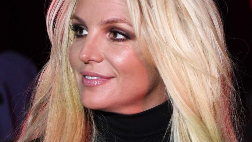 Britney Spears Turns Up the Heat While Posing in Cut-Out Mini-Dress