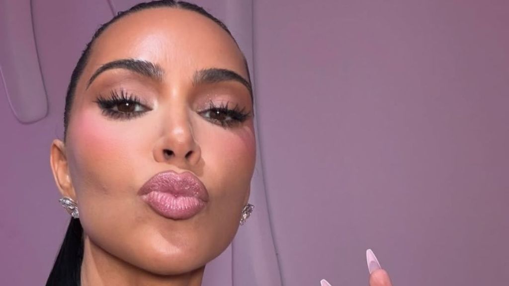 Kim Kardashian Sunbathes in Leopard-Print Bikini