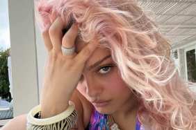 Bebe Rexha Dips in Water Wearing a Bold Swimsuit