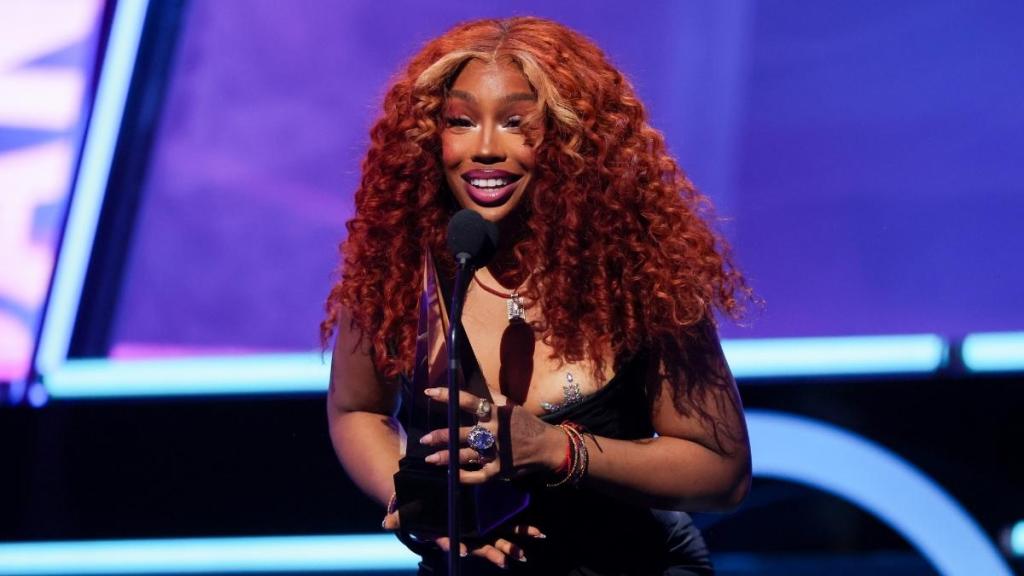SZA’s Red Corset Moment Has Fans Dropping ‘Stunning’ in the Comments