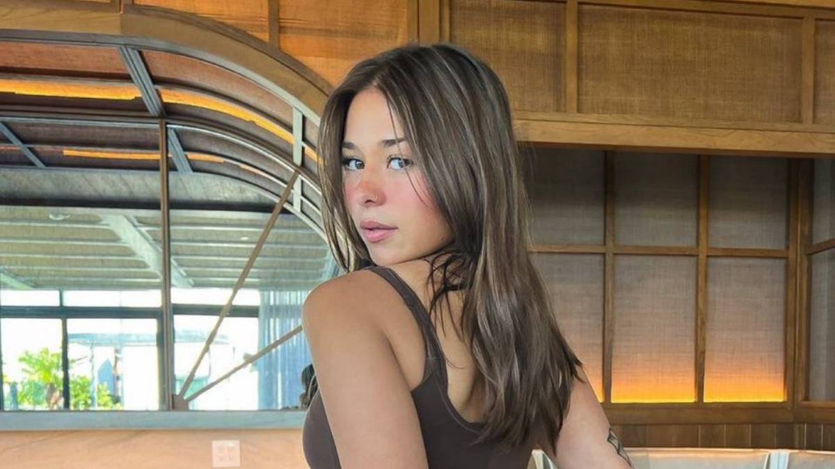 OnlyFans' Sophie Rain Wearing Brown Mini-Dress Will Distract You