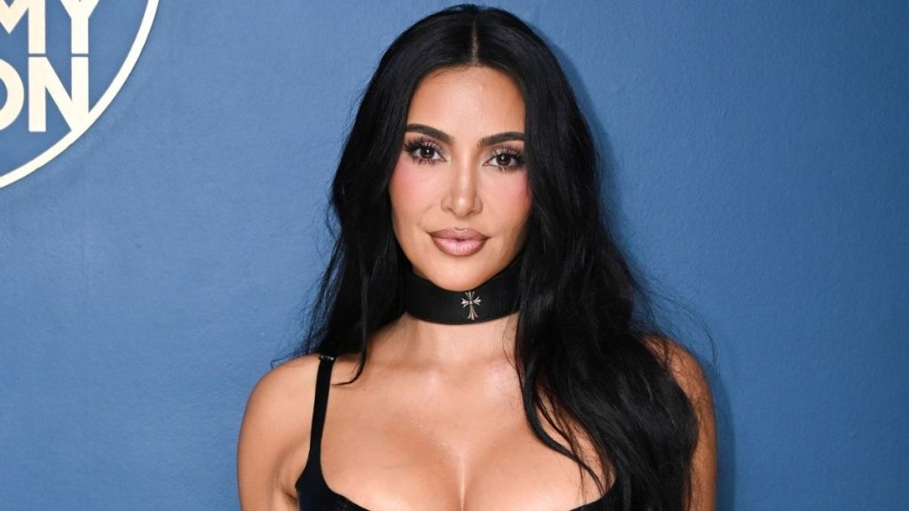 Kim Kardashian Poses in Sheer Black Crop Top For SKIMS