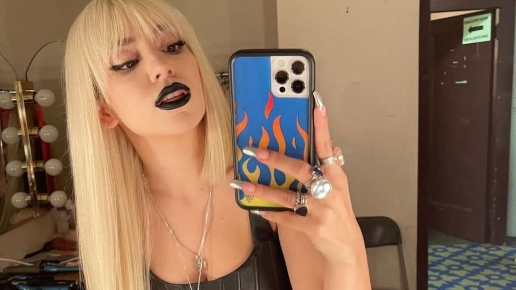 Ava Max’s Bodysuit and Net Stockings Look Is Unmissable