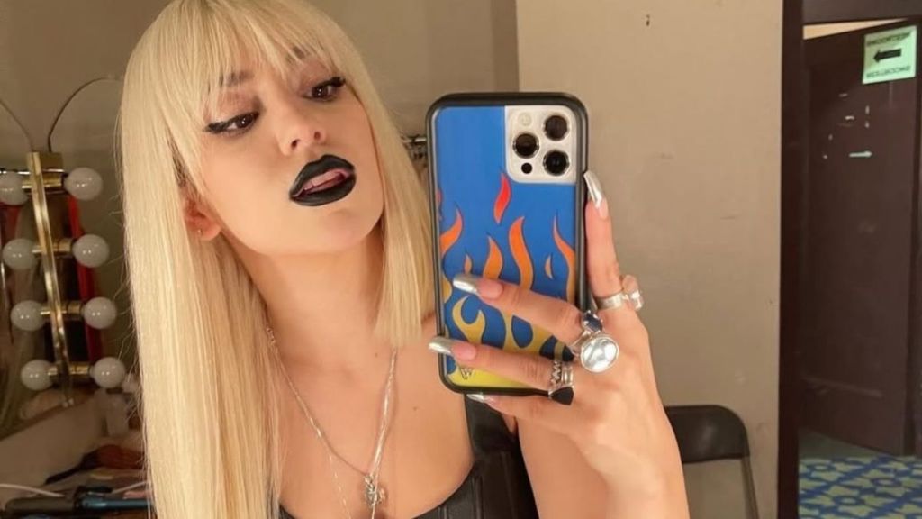 Ava Max Shows Off Corset-Style Top in New Photos