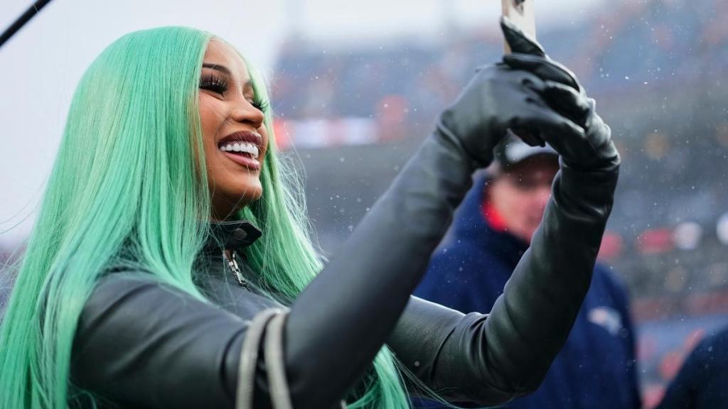Cardi B Pairs Green Hair With Chic All-Leather Look