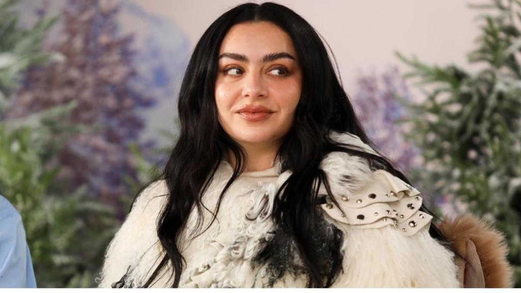 Charli XCX Models a Fur Coat & Thong in New Photo