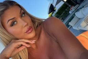 Eve Gale Enjoys Winter Sun in Bold Sheer Dress