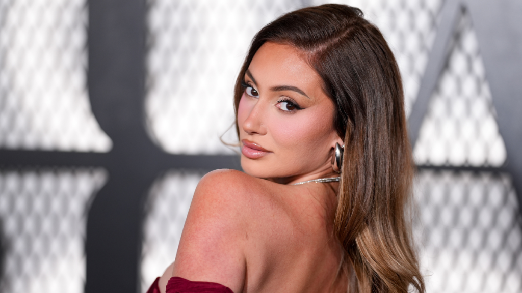 Francesca Farago Poses in Bold Cut-Out Top For 'Mommy Night Out'