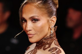 Jennifer Lopez's Sheer Gown Exposes Her Toned Abs